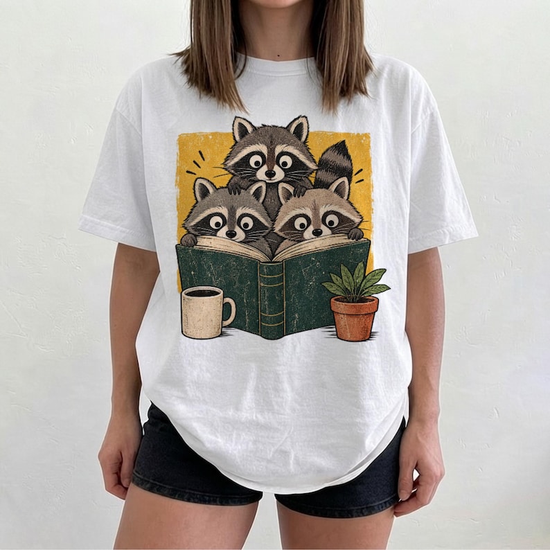 Three Curious Raccoons Reading Book T-shirt | Coffee & Plant ...