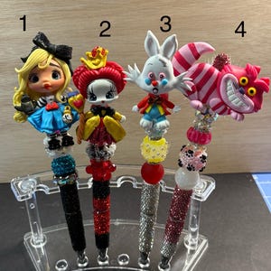 One of a kind Alice in Wonderland Clay doll Rhinestone pen