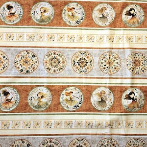 May include: Fabric with a repeating pattern of circular illustrations of girls and floral designs. The fabric features alternating bands of brown, beige, and gray with decorative floral and star patterns.