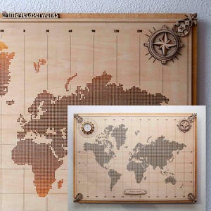 May include: Wooden world map with compass and gear detailing. The map is made of light-coloured wood with a dotted design for the continents. A smaller framed map is also visible.
