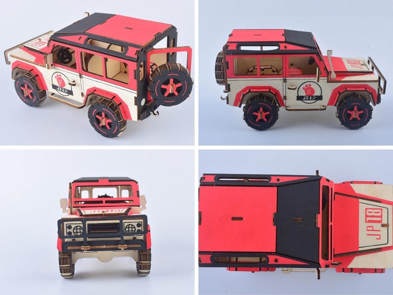 May include: A wooden model of a red, black, and cream-colored off-road vehicle. The model has a spare tire on the back and features intricate details. The wheels are black with red star-shaped accents. The model has the text "JP 18" on the side.