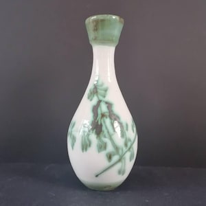 Small Korean White Celadon-Glazed Peony Bottle Vase,  Late Joseon, C. 1900-1910