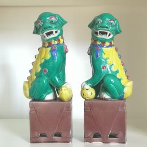 Pair of  Chinese Sancai Glazed Mythical Foo Dogs On Stands, Republic Period