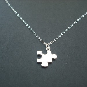 sterling silver puzzle piece necklace