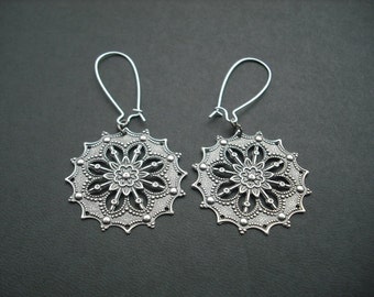 star flower stamped earrings