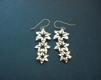 matte yellow gold triple star flower pendant earrings