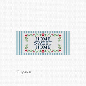 May include: Cross-stitch pattern featuring a blue and white striped banner with the text "Home Sweet Home" surrounded by a floral border with red flowers and green leaves.