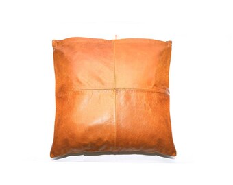 Cuscino in pelle: realizzato e cucito a mano per un lusso confortevole