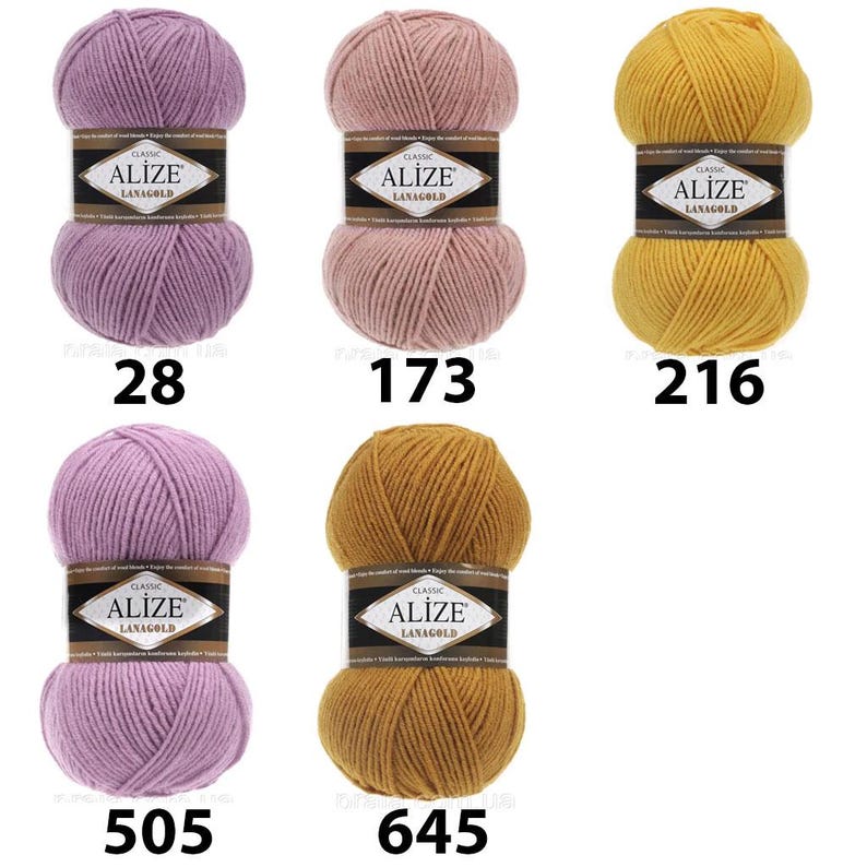 May include: Five balls of Alize Lanagold Classic yarn in shades of lavender, pink, and gold. Each ball has a black and gold label with the Alize Lanagold Classic logo and a colour number. The colour numbers are 28, 173, 216, 505, and 645.