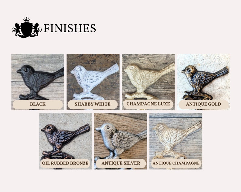 May include: A set of bird-shaped hooks in various finishes, including black, shabby white, champagne luxe, antique gold, oil rubbed bronze, antique silver, and antique champagne. The hooks are displayed on a wooden background.
