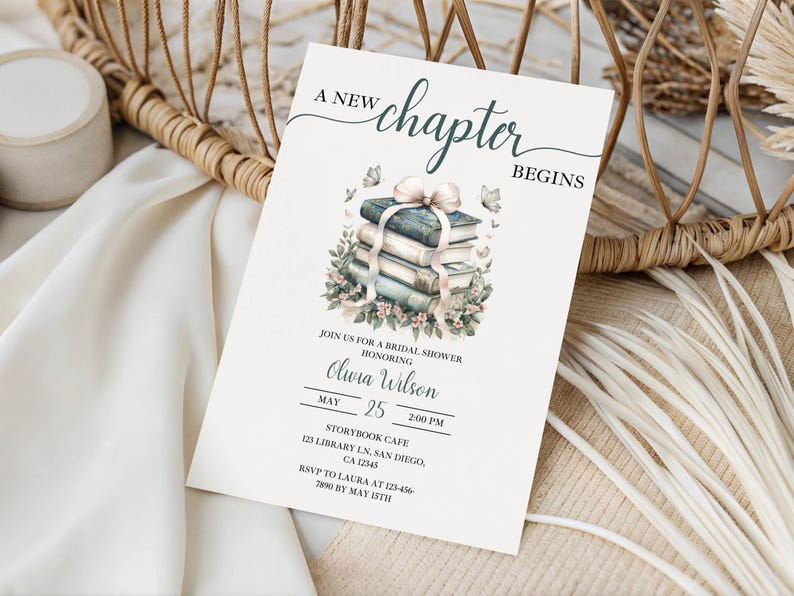 May include: A bridal shower invitation with the text "A New Chapter Begins." The invitation features a watercolor illustration of a stack of books tied with a ribbon and floral accents. The invitation includes the name Olivia Wilson, the date May 25, and the time 2:00 PM.