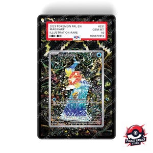 May include: A graded Pokémon card featuring Magikarp, an illustration rare. The card is encased in a black holder with text that reads "2023 Pokemon Pal En Magikarp Illustration Rare." The card art depicts Magikarp in a waterfall setting.
