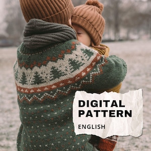 May include: A green knit sweater featuring a fair isle pattern with pine trees, zig-zag lines, and small dots in cream and rust orange. A white paper scrap overlay displays the black text: DIGITAL PATTERN ENGLISH.
