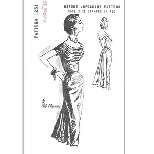 May include: Vintage sewing pattern for a dress, size 14, by Coil Chapman. The pattern shows a woman wearing a black dress with a fitted bodice and a flowing skirt.