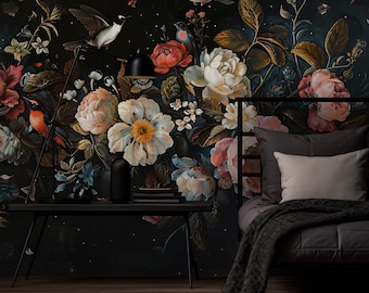 May include: Dark floral wallpaper with large, detailed flowers in pink, white, and yellow, and birds in flight. The wallpaper has a dark background, creating a dramatic and elegant aesthetic. The wallpaper is suitable for a bedroom.