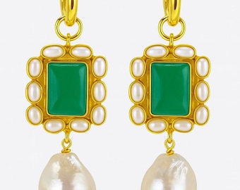 Gold hoop earrings with a rectangular green stone; green gemstone surrounded by white pearls; large white dangling pearl