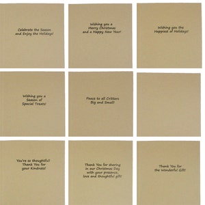 May include: Nine square greeting cards with various holiday messages printed in black on a tan background. Messages include "Celebrate the Season," "Merry Christmas," "Happiest of Holidays," and "Thank You." Ideal for holiday greetings.