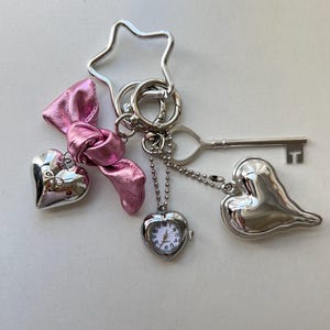 Y2K pink bow keychain, silver heart watch keychain,star clasp keychain, silver key pendant accessory,Cute bag accessory, watch jewelry gift.