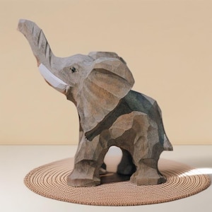 Hand-Carved Basswood Elephant Figurine: Rustic Good Luck Symbol