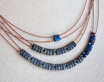 Data Types Tila glass, sterling silver and bronze cord multi-strand necklace
