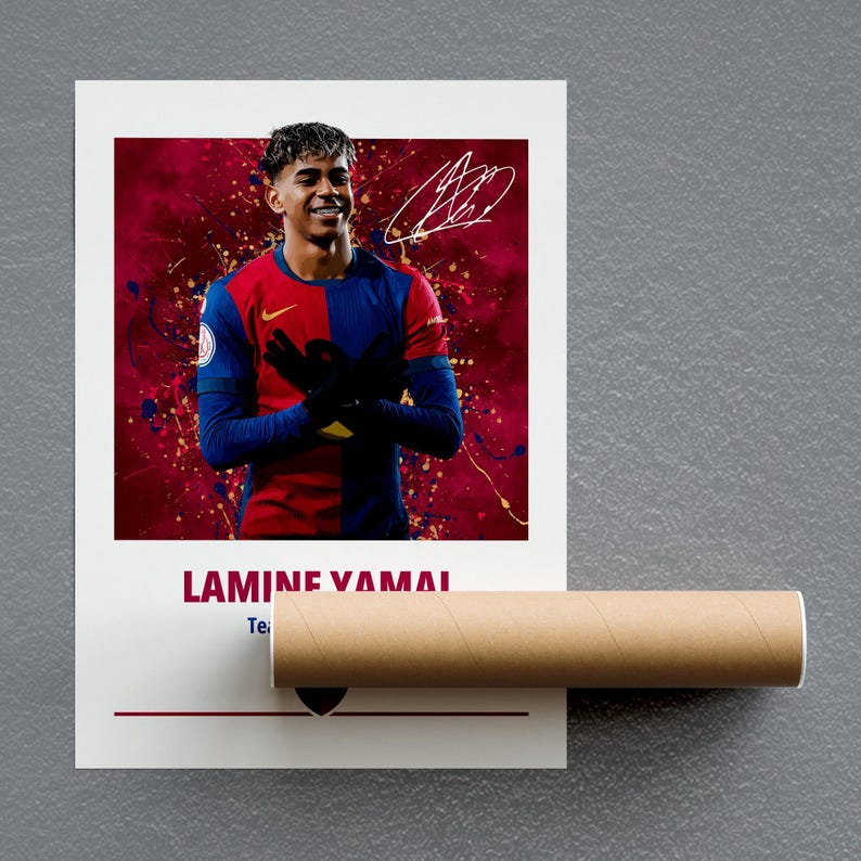 May include: A white poster with a photo of a soccer player in a red and blue jersey. The player is standing with his arms crossed and has a serious expression on his face. The poster has the text "LAMINE YAMAL" and "Te" at the bottom.