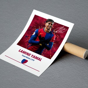 May include: A white poster with a red, yellow, and blue background featuring a soccer player wearing a red and blue jersey with the number 19. The poster reads "Lamina Yamal Team Name | #19".