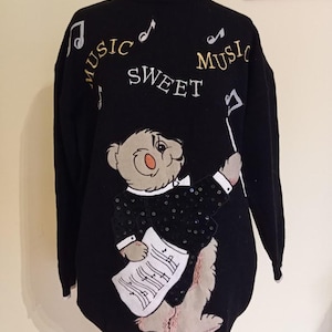 Vintage knitted black sweater 90s rare legendary series with applique Cote a Cote