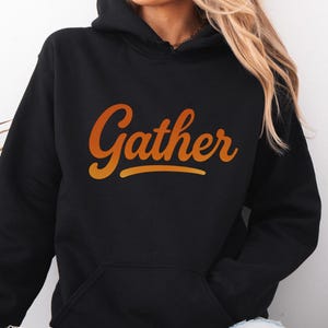 Gather Fall Hoodie – Cozy Thanksgiving Pullover, Warm Script Sweatshirt for Family Gatherings, Unisex Autumn Gather Hooded Sweatshirt