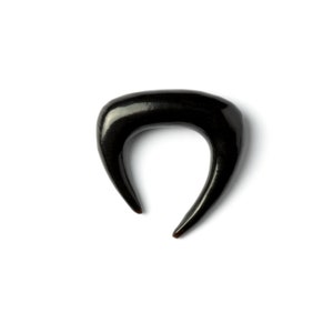 May include: Black horn ear gauge with a curved, pointed design.