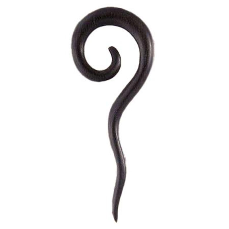 May include: A dark brown, smooth, curved ear taper shaped like a spiral. The jewelry features a rounded top that coils inward, tapering down into a slender, elongated point at the bottom. The surface has a polished finish with visible wood grain.