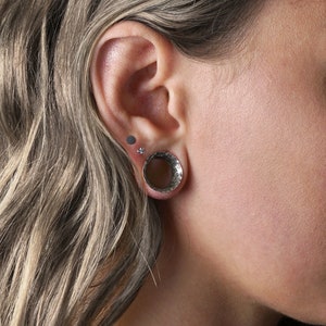 model wearing Hammered 925 Silver double flared ear tunnel