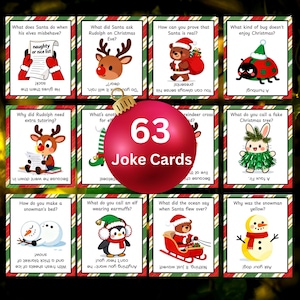 May include: A collection of 63 Christmas joke cards, each with a festive illustration and a joke. The cards feature Santa, reindeer, and elves, with a red bauble in the center displaying "63 Joke Cards". The cards are bordered with green and red stripes.