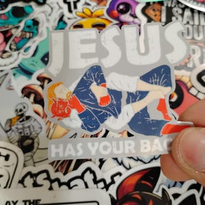 Jesus Has Your Back Sticker, Christian, Waterproof, Hard Hat, Skateboard, Laptop, Water Bottle, Sticker Decal