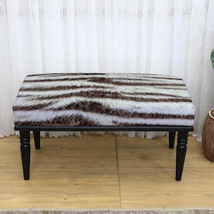 Zebra Striped Ottoman with Dark Decorative Legs, Brown and White Fur-Like Print, Cozy Rectangular Seat, Upholstered Accent Furniture, Bench
