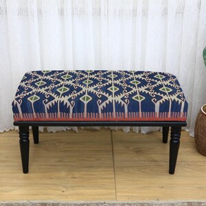 Rectangular Ottoman Stool with Abstract Geometric Patterned Top and Light Wood Turned Legs, Modern Artistic Accent for Contemporary Spaces