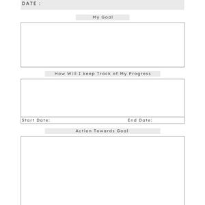 May include: A white goal planner with the text "GOAL PLANNER" at the top. The planner includes sections for the date, goal, progress tracking, start and end dates, and actions. The design is minimalist and functional.