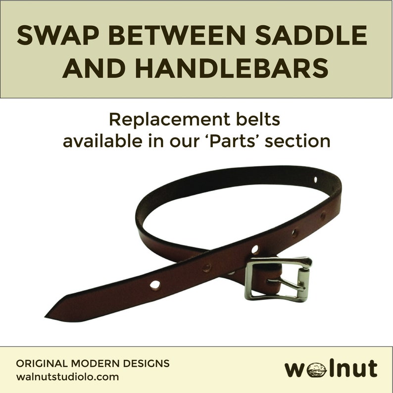 Dark brown leather replacement belt on white background. Header above reads "Swap Between Saddle and Handlebars". Text below reads "Replacement belts available in our 'Parts' section".