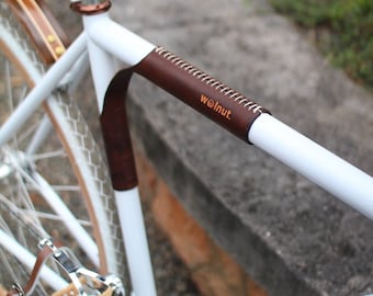 Leren bovenbuisbeschermer en fietsendrager - De "Portage Strap" - Leren fietsaccessoires