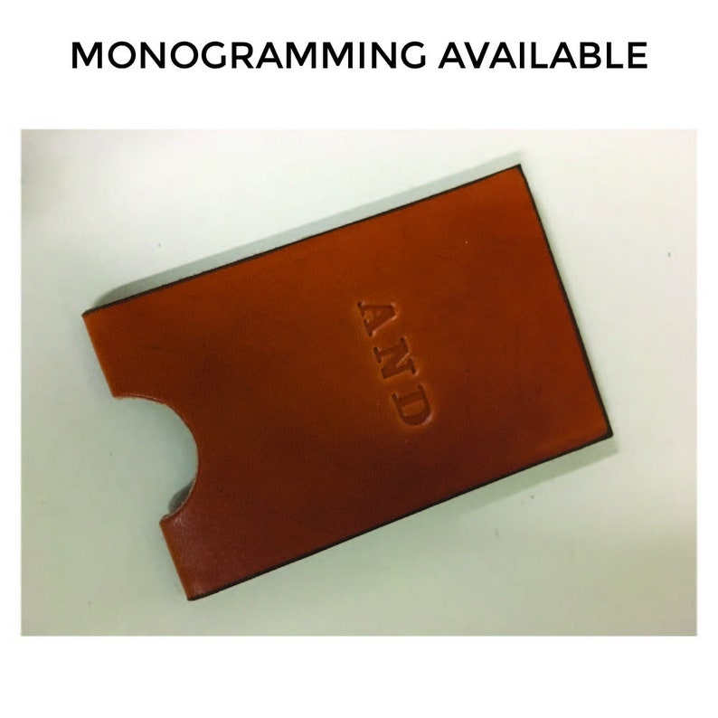 Honey leather variant card wallet with debossed monogramming with letters "AND" with the text "Monogramming Available" above the image