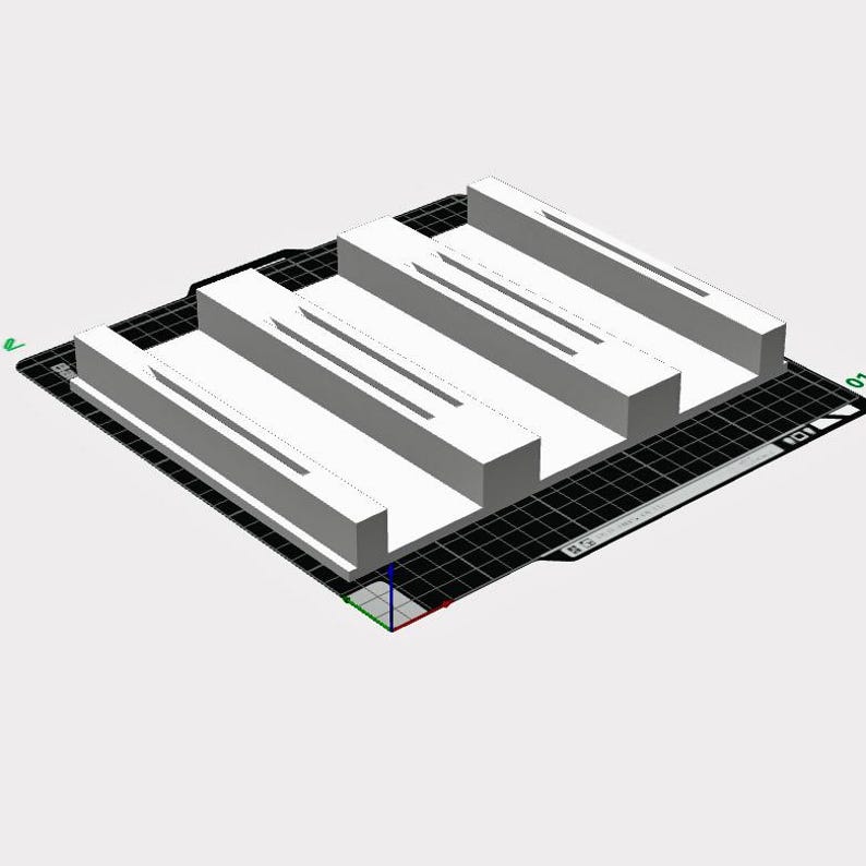 3D printer software preview showing the filament spool holder base as a digital STL model, displayed on a virtual print bed before printing.