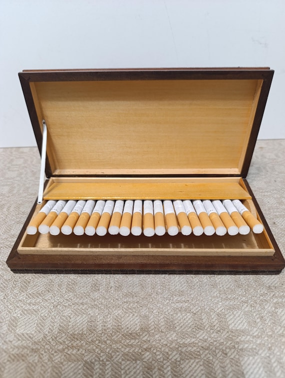 inside a cigarette Schematic illustration of a typical e-cigarette: This device mainly