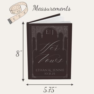 May include: A dark brown book with the title "Her Vows" in elegant script. The book is 8 inches tall and 5.75 inches wide, with the names Ethan & Jennie and the date 10.31.25. The cover features decorative arch details.