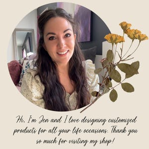 May include: A circular portrait of a person with long dark hair wearing a light-colored floral blouse, positioned next to a stem of dried yellow roses. Below the image, the text reads: Hi, I'm Jen and I love designing customized products for all your life occasions. Thank you so much for visiting my shop!