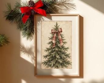 May include: A framed print of a green pine tree featuring a red and white plaid bow at the top, set against a neutral background. The frame is light wood with a white mount. A pine branch with a bright red ribbon bow is attached to the top corner.