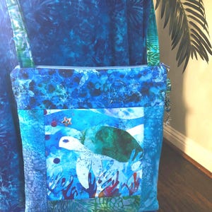 Tropical Beach Fabric Panel Sea Turtle Honu Design Coral Reef Underwater Scene Organic Cotton Quilting Square Aqua Turquoise Blue Green Navy Purple Colors Beautiful Marine Theme Sewing Project Material Perfect Wall Hanging Art Coastal Craft