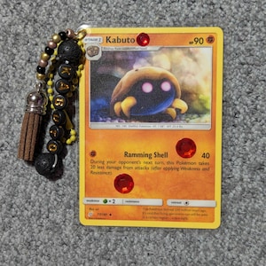 Chaveiros de cartas Pokémon do tipo Rock