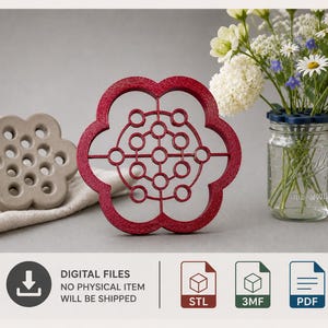 May include: A set of three flower-shaped floral frogs for arranging stems in a glass jar. One is a solid beige ceramic piece, one is a red textured frame with a circular grid, and one is a dark blue cap placed atop a clear glass mason jar.