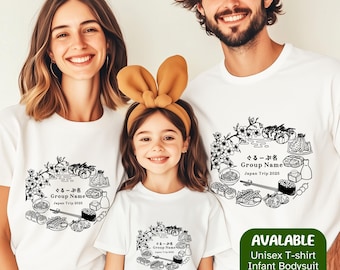 May include: A family matching set of white t-shirts with a black and white graphic design of Japanese food and cherry blossoms. The text on the shirts reads "ぐるーぷ名 Group Name Japan Trip 2025".