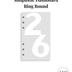 May include: A light gray ring bound dashboard featuring the large white numbers 2 and 6. The text Simplistic Dashboard Ring Bound appears at the top, and Angel Kay Studio is printed at the bottom. Six circular punch holes are aligned on the left side.