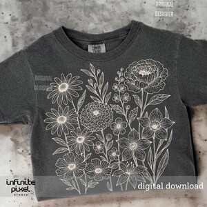 May include: Dark gray t-shirt featuring a detailed white floral design. The design includes various flowers and foliage. The text "digital download" is visible at the bottom. The shirt is from the "Comfort Colors" brand.